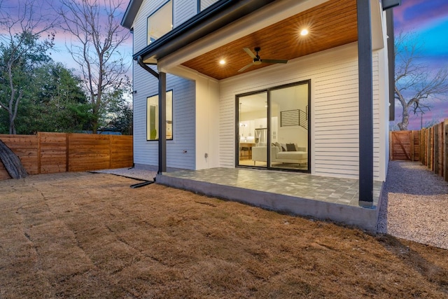 4402 Garnett St Unit 1, Austin, TX 78745 - rear view of house with a patio area, a ceiling fan, and a fenced backyard