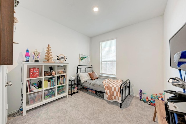 carpeted bedroom with recessed lighting