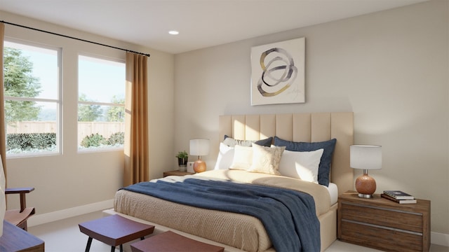 bedroom featuring recessed lighting, multiple windows, and baseboards