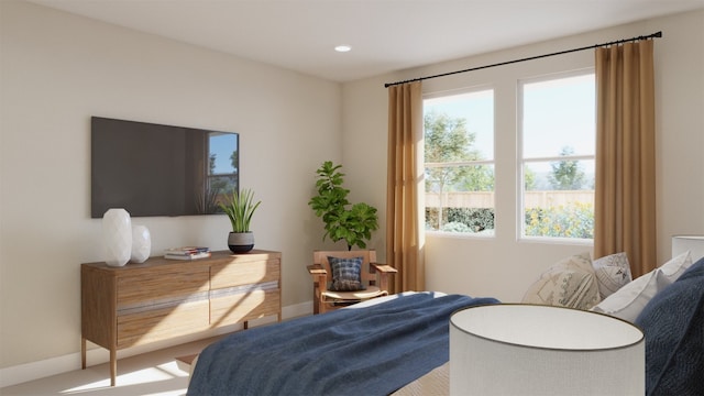 bedroom featuring baseboards and recessed lighting