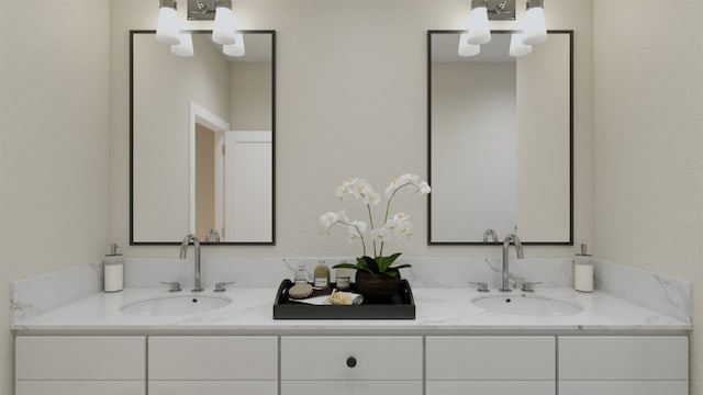 bathroom featuring a sink and double vanity