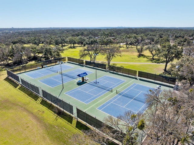 view of tennis court with fence