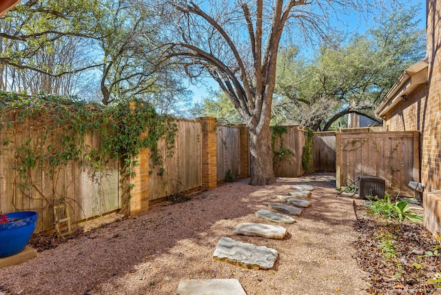 view of yard with a fenced backyard