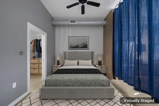 2235 E 6th St Unit 210, Austin, TX 78702 - bedroom featuring a walk in closet, ceiling fan, and vaulted ceiling