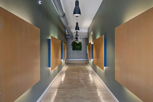 2235 E 6th St Unit 210, Austin, TX 78702 - hallway with finished concrete flooring