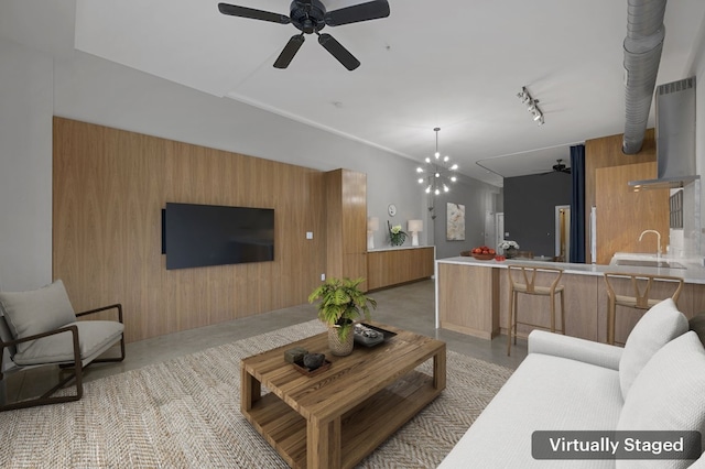 2235 E 6th St Unit 210, Austin, TX 78702 - living area featuring a ceiling fan and track lighting