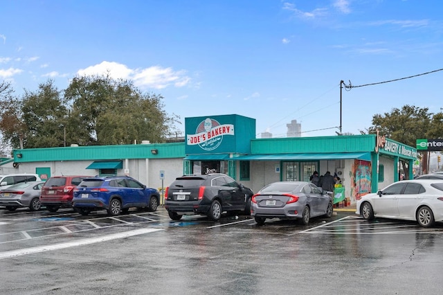 2235 E 6th St Unit 210, Austin, TX 78702 - view of commercial property with uncovered parking