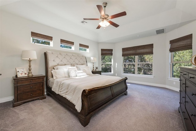 bedroom featuring visible vents, baseboards, carpet floors, and ceiling fan