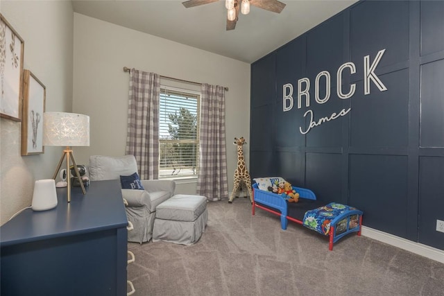 bedroom with a ceiling fan and carpet