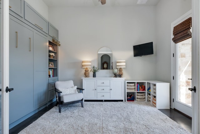 living area with dark wood-style floors