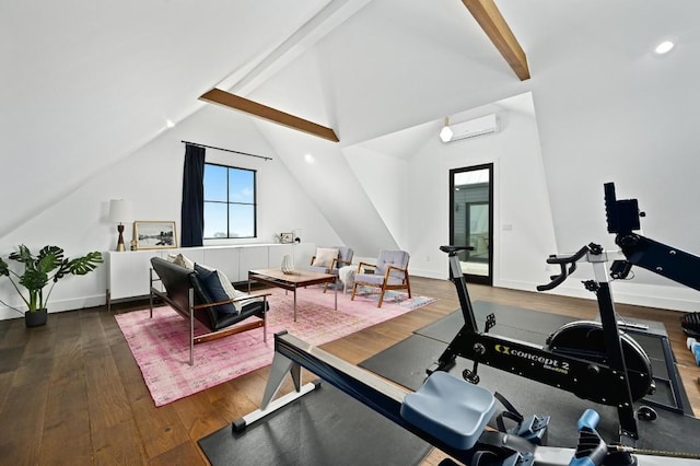 exercise room with baseboards, vaulted ceiling, wood finished floors, and a wall mounted air conditioner