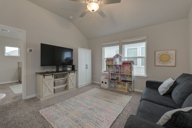 116 Evening Star Ln, Georgetown, TX 78628 - living area with plenty of natural light, light carpet, vaulted ceiling, and a ceiling fan