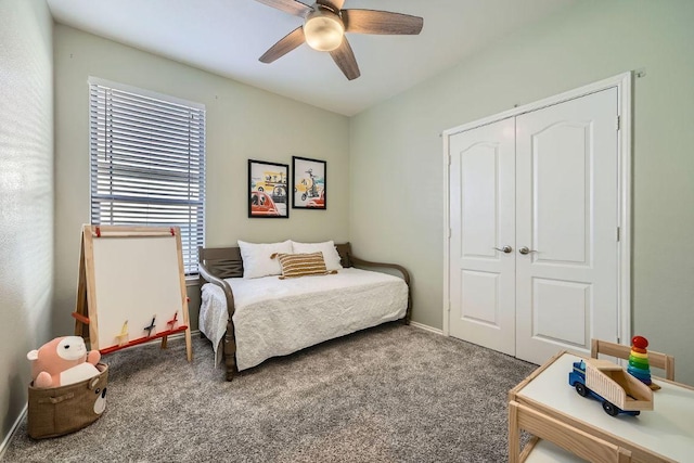 bedroom with ceiling fan, a closet, and carpet