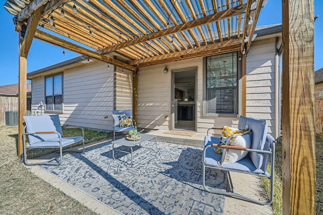 view of patio / terrace featuring central AC and a pergola