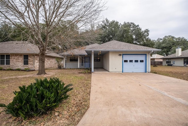 ranch-style house with covered porch, concrete driveway, a shingled roof, and an attached garage