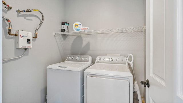 laundry area with washer and dryer and laundry area