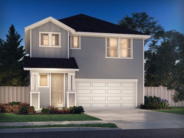 traditional-style house featuring concrete driveway, board and batten siding, an attached garage, and fence