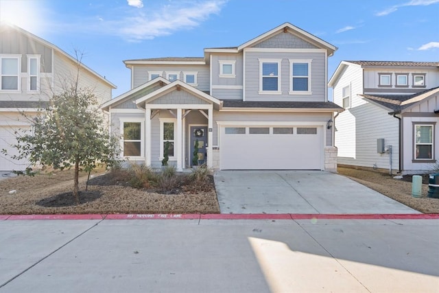 view of front of house featuring a garage and concrete driveway