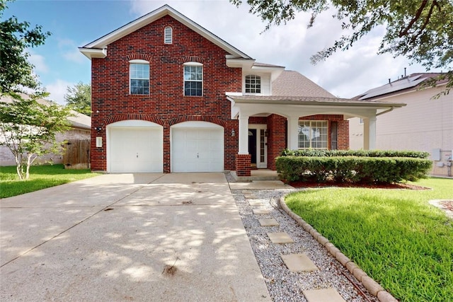 5008 Barlow Dr, Round Rock, TX 78681 - view of front facade featuring brick siding, driveway, an attached garage, and a front yard