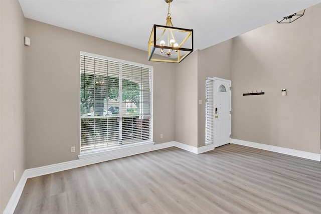 5008 Barlow Dr, Round Rock, TX 78681 - foyer with a chandelier and wood finished floors