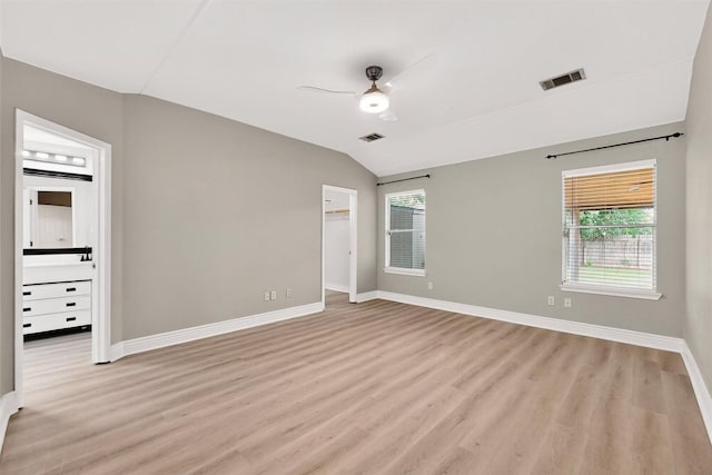 5008 Barlow Dr, Round Rock, TX 78681 - unfurnished room featuring a ceiling fan, light wood-style flooring, and lofted ceiling