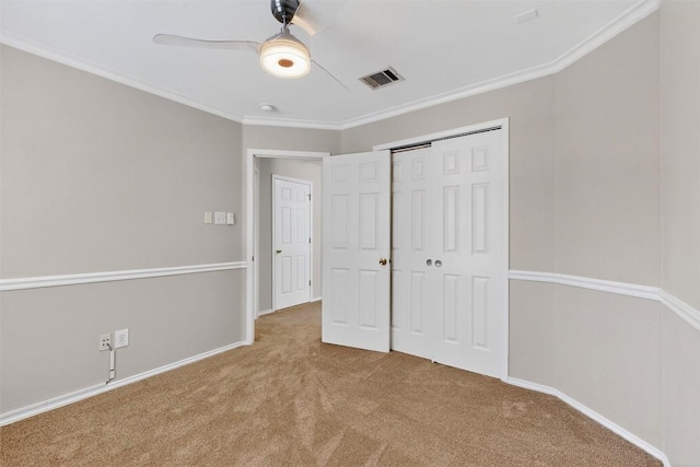 5008 Barlow Dr, Round Rock, TX 78681 - unfurnished bedroom featuring carpet flooring, crown molding, a closet, and ceiling fan