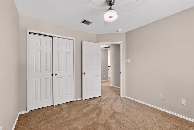 5008 Barlow Dr, Round Rock, TX 78681 - unfurnished bedroom with carpet flooring, a closet, and a ceiling fan