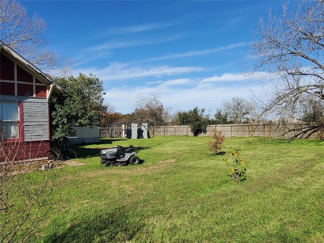 view of yard with fence