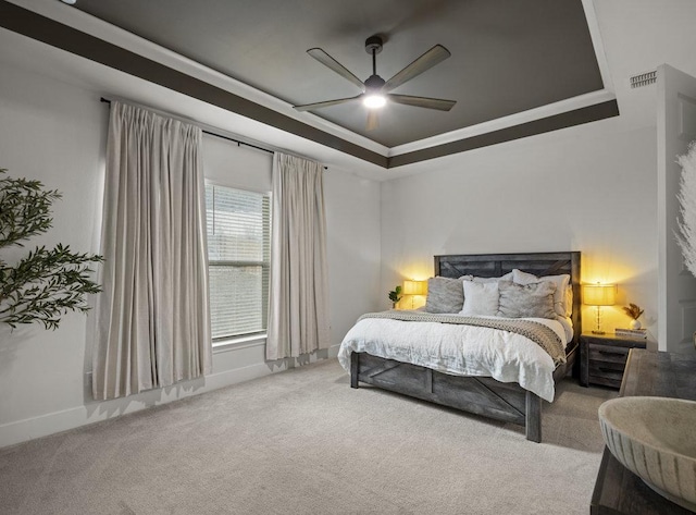 5824 Antelope Well Ln, Austin, TX 78738 - bedroom with a tray ceiling, carpet flooring, baseboards, and a ceiling fan