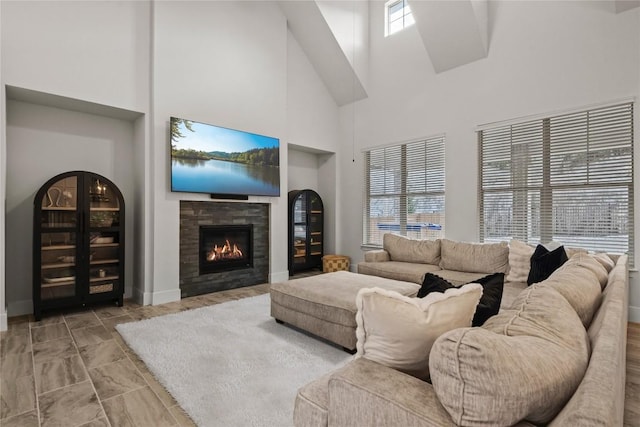 5824 Antelope Well Ln, Austin, TX 78738 - living area with a towering ceiling and a tile fireplace