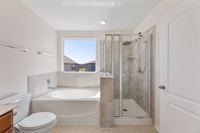 213 Lemon Light Ln, Pflugerville, TX 78660 - full bath featuring a garden tub, toilet, a stall shower, and tile patterned floors