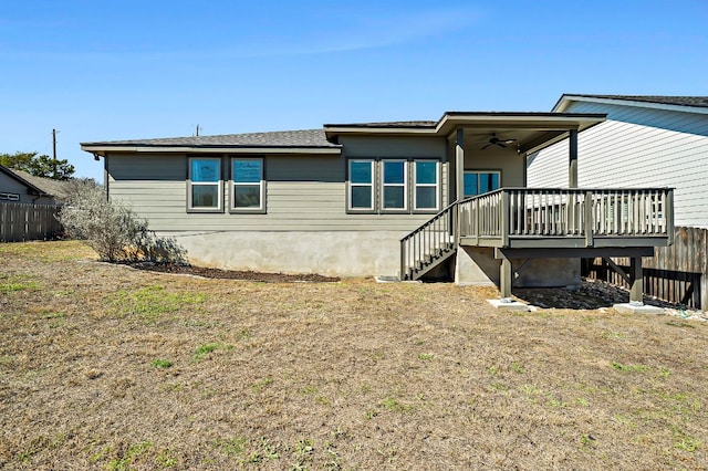 back of house featuring a deck, stairway, fence, and a ceiling fan