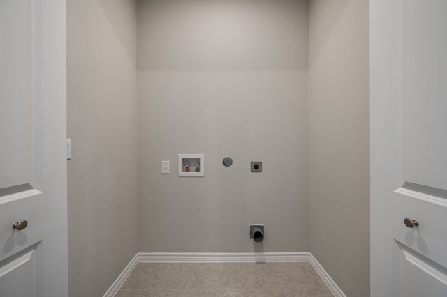 305 Bolivar Way Unit 101, San Marcos, TX 78666 - laundry area featuring hookup for an electric dryer, washer hookup, gas dryer hookup, and tile patterned floors