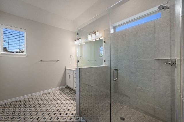 305 Bolivar Way Unit 101, San Marcos, TX 78666 - full bath featuring vanity, a stall shower, and tile patterned floors