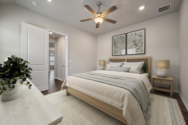 305 Bolivar Way Unit 101, San Marcos, TX 78666 - bedroom featuring dark wood-style floors, recessed lighting, and a ceiling fan