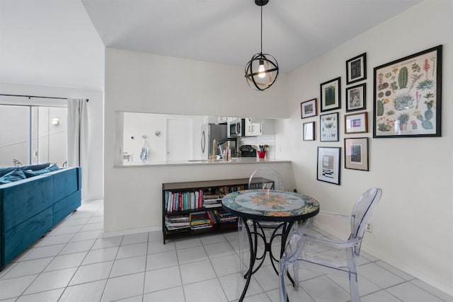 tiled dining space with baseboards