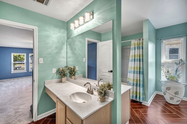 15401 Montoya Cv, Austin, TX 78717 - bathroom with vanity, baseboards, and a shower with shower curtain