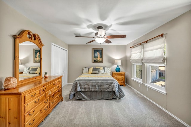 15401 Montoya Cv, Austin, TX 78717 - carpeted bedroom featuring a closet, baseboards, and ceiling fan