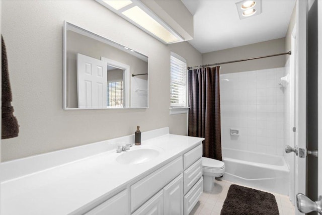 full bathroom with toilet, tile patterned floors, shower / bath combo with shower curtain, and vanity