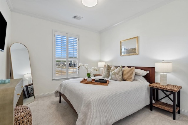 bedroom featuring light carpet, baseboards, visible vents, and ornamental molding