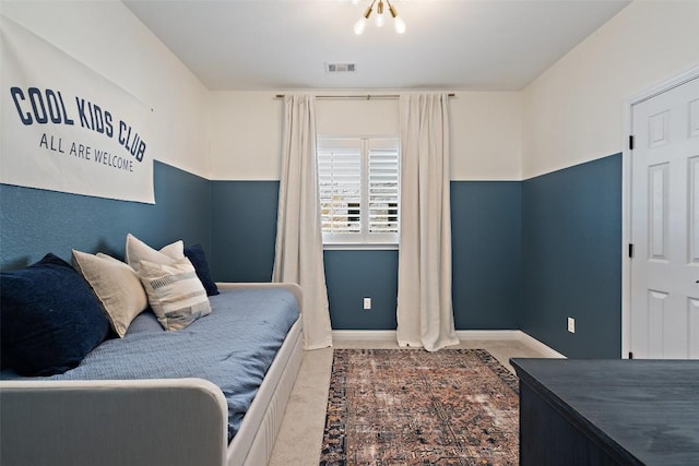 bedroom featuring carpet floors, baseboards, and visible vents