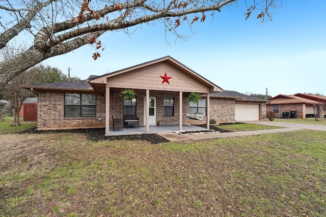 402 Laurel St, Bastrop, TX 78602 - ranch-style house with brick siding, driveway, and an attached garage