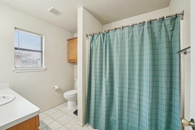 402 Laurel St, Bastrop, TX 78602 - bathroom featuring vanity, tile patterned flooring, and a shower with shower curtain