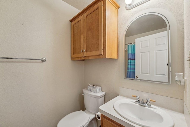402 Laurel St, Bastrop, TX 78602 - bathroom featuring toilet and vanity