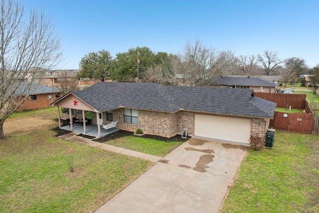 402 Laurel St, Bastrop, TX 78602 - ranch-style house with an attached garage, driveway, brick siding, and roof with shingles