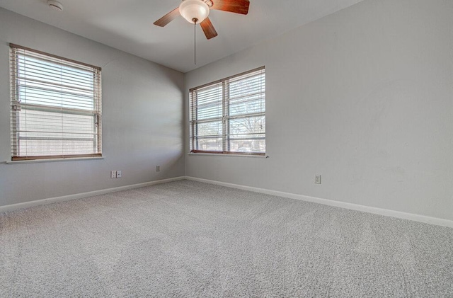 7803 Lazy Ln, Austin, TX 78757 - carpeted empty room with a ceiling fan and baseboards