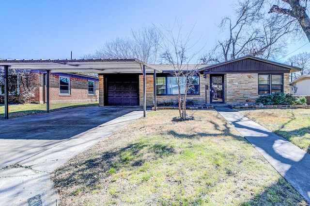 7803 Lazy Ln, Austin, TX 78757 - single story home with a garage, aphalt driveway, a front lawn, stone siding, and an attached carport