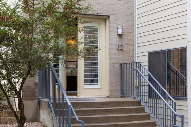 707 Cardinal Ln Unit E2, Austin, TX 78704 - doorway to property with brick siding
