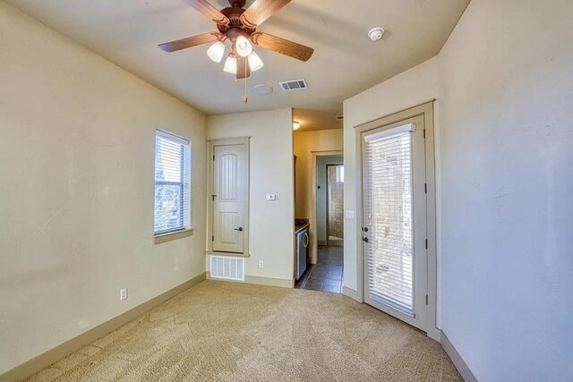 102 Maravilla Way, Horseshoe Bay, TX 78657 - spare room with carpet, a ceiling fan, and a smoke detector