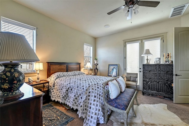 102 Maravilla Way, Horseshoe Bay, TX 78657 - bedroom featuring carpet flooring and a ceiling fan